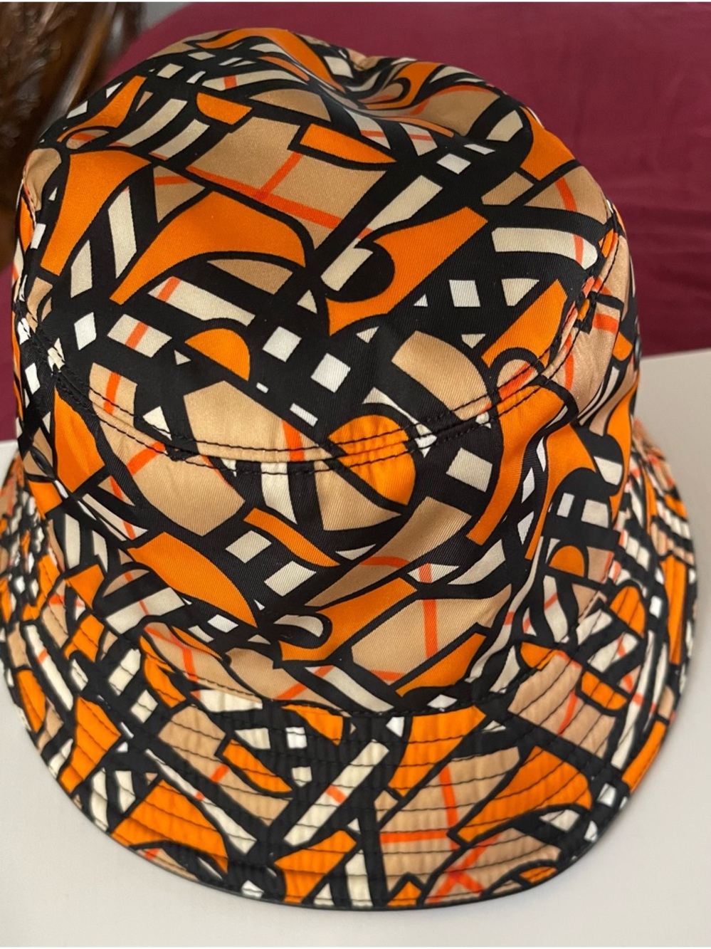 AUTHENTIC BURBERRY …Orange & Black Graphic Bucket Hat